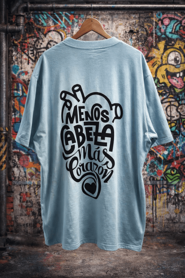 REMERA OVER MENOS CABEZA MÁS CORAZÓN